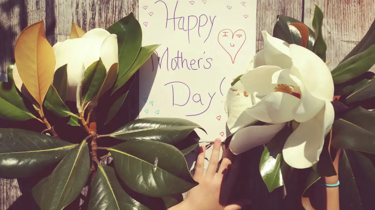 picture of a mother's day cart surrounded by flowers