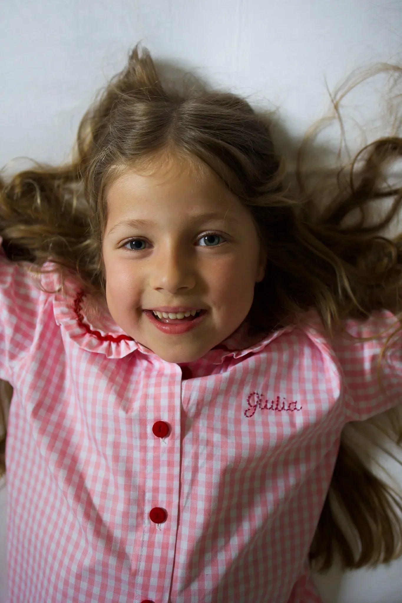 Picture of a child wearing a Cajou Paris' organic cotton pajama